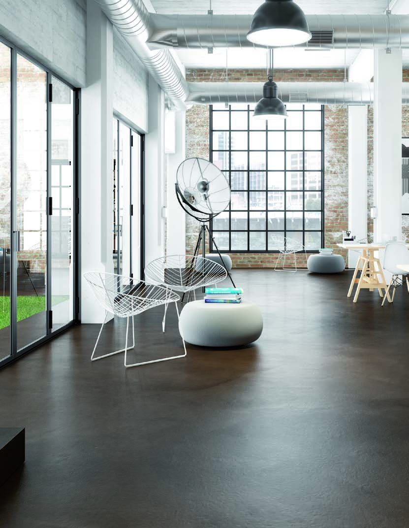Loft Wohnbereich mit dunklem Designboden in Spachteltechnik
